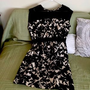 Black & white cocktail dress perfect for weddings, versatile to wear casually